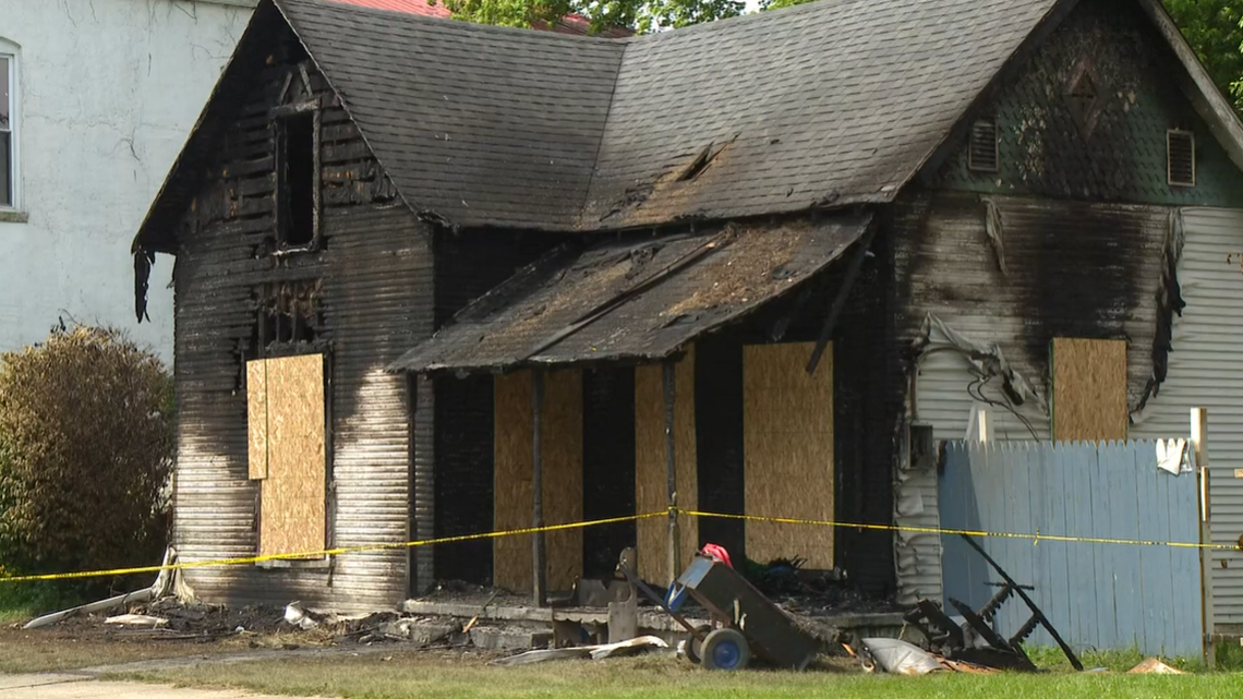 An Indiana wife and mother is accused of walking away from her home as it burned with her children inside, officials say.