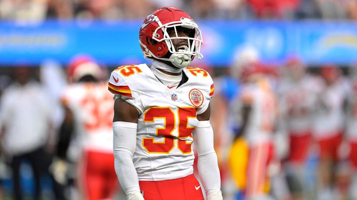 Kansas City Chiefs cornerback Jaylen Watson (35) celebrates after breaking up a pass intended for Los Angeles Chargers wide receiver Joshua Palmer (5) in the second half at SoFi Stadium.