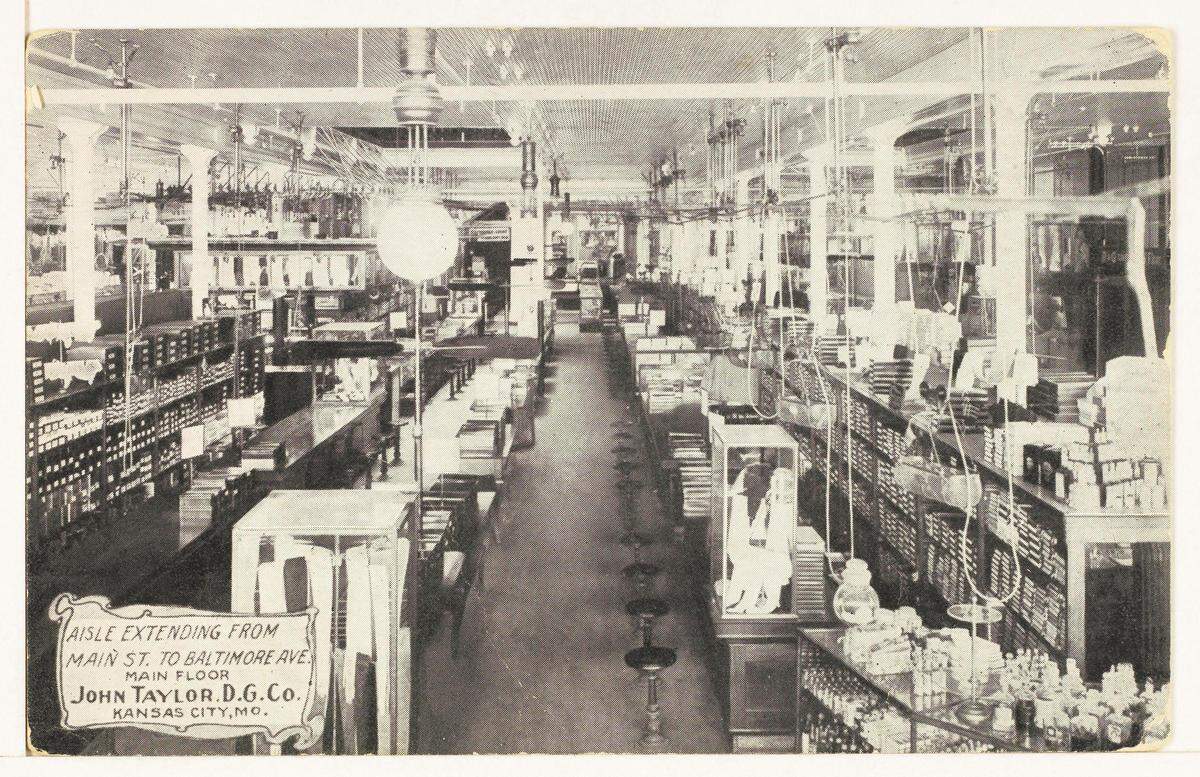 Early 1900s postcard of the interior of the John Taylor Dry Goods Company. 