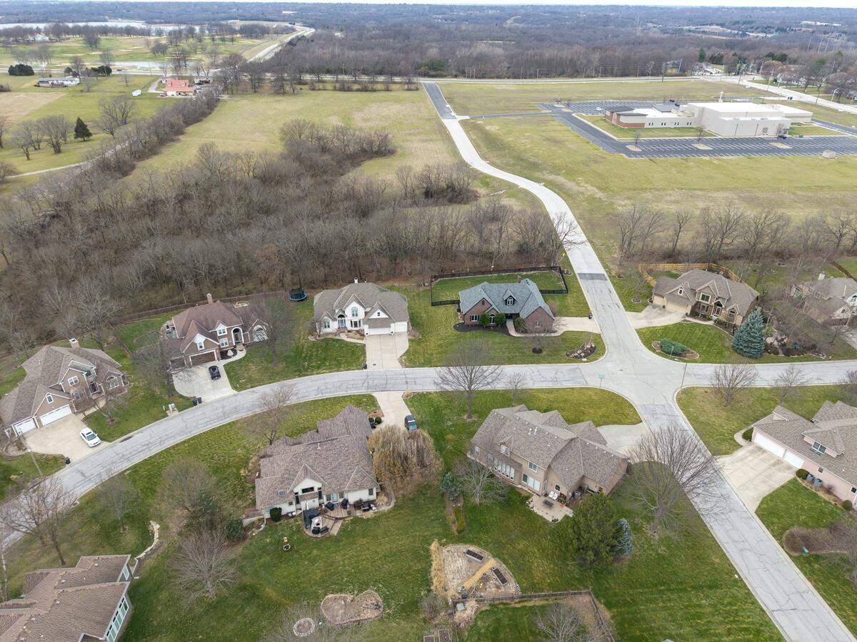 Some residents of a nearby neighborhood are opposed to the proposed site of The View High Sports Complex, upper left, at 3301 NW Ashurst Dr. in Lee's Summit. The 17-acre field, pictured on March 23, 2026, is slated for a 180,000-square-foot facility anchored by a massive inflatable soccer dome.