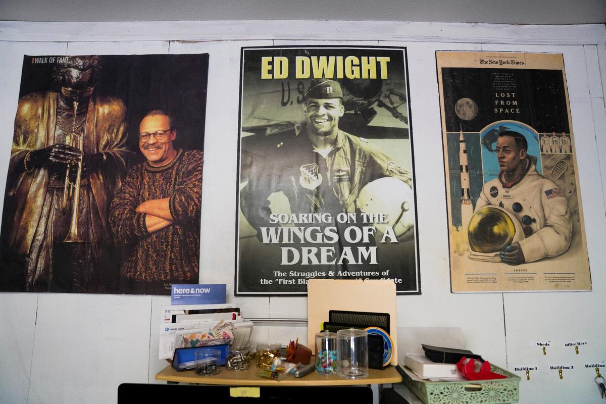 Posters that help illustrated a life Dwight calls “a series of anomalies” adorn his studio in Denver, where he has produced such works as 132 major memorials across the United States.