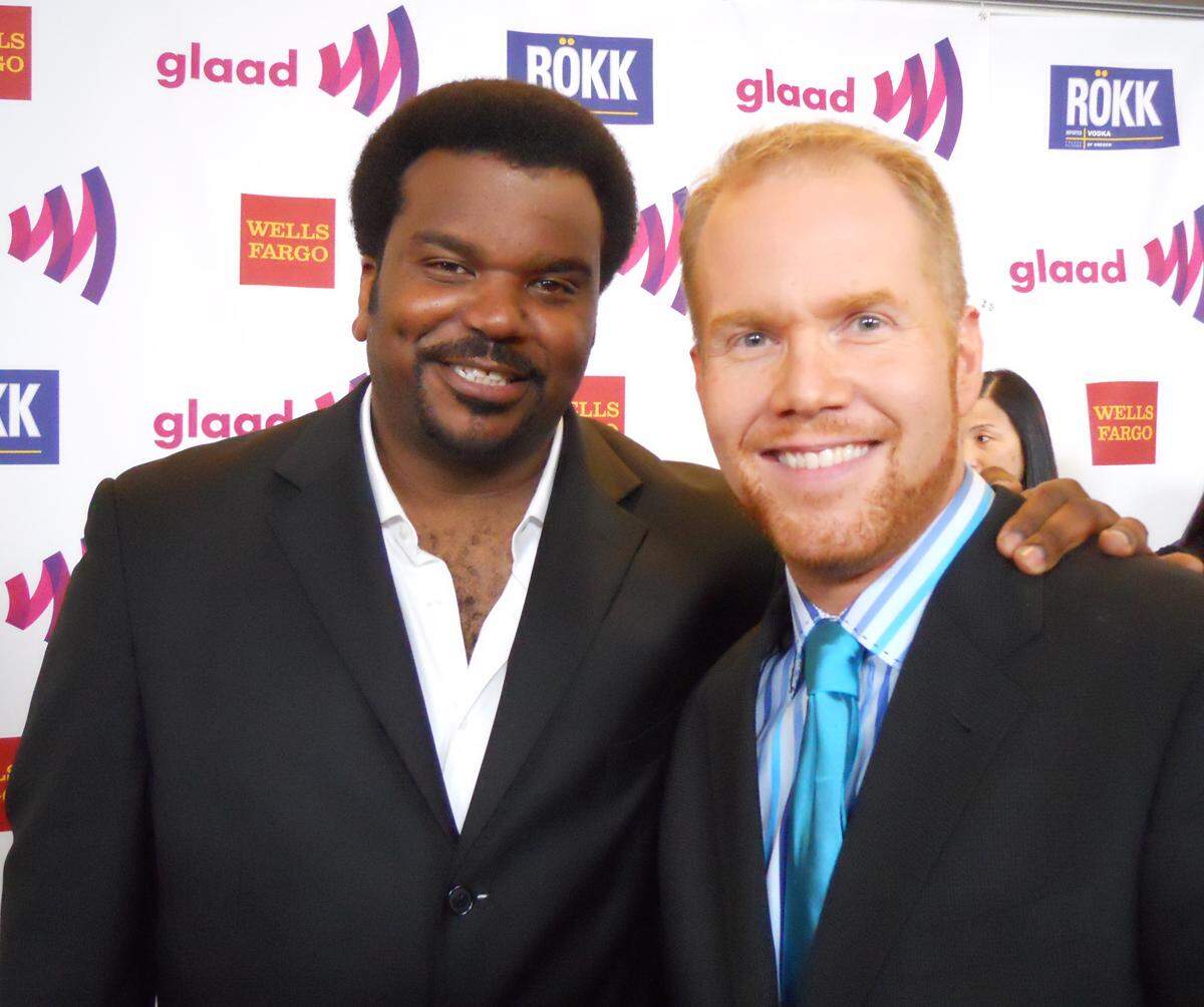With comedian Craig Robinson.