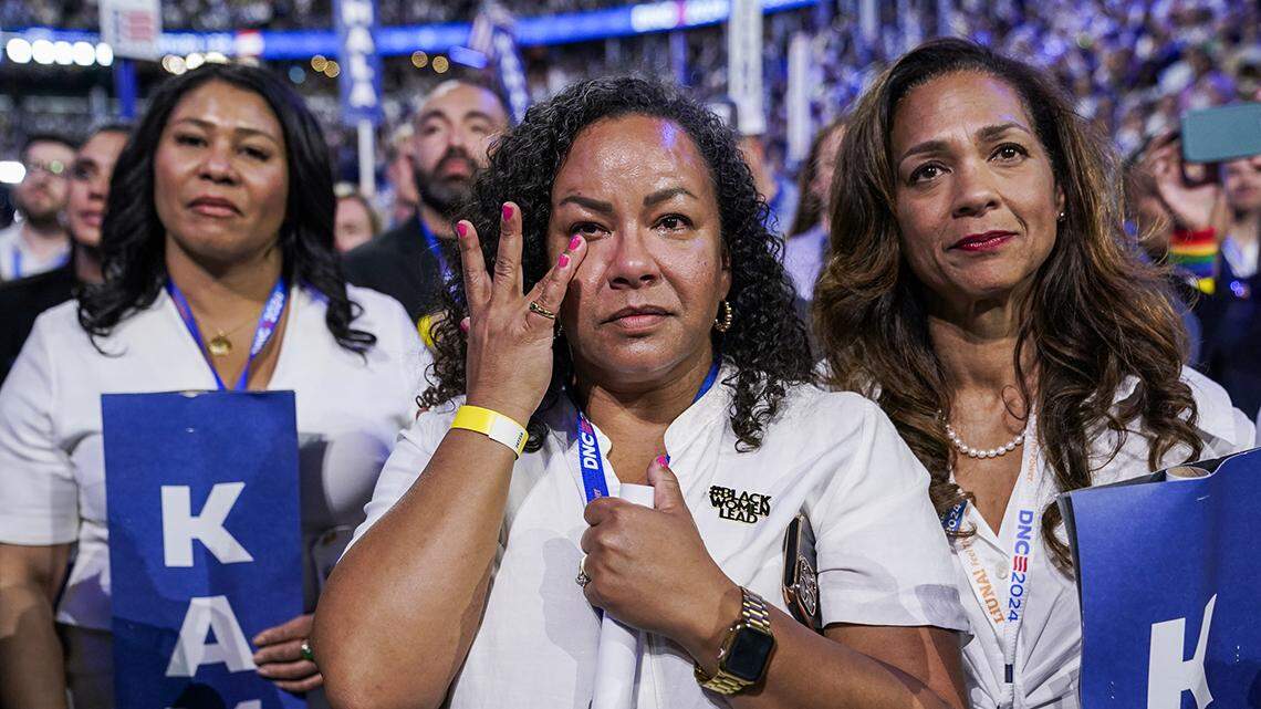 Shay Franco-Clausen (Center) and Aimee Allison (Right) watch Vice President Kamala Harris deliver a speech on Day Four of the 2024 Democratic National Convention held at the United Center in Chicago, Illinois on August 22, 2024. (Photo by Nathan Howard/Sipa USA)