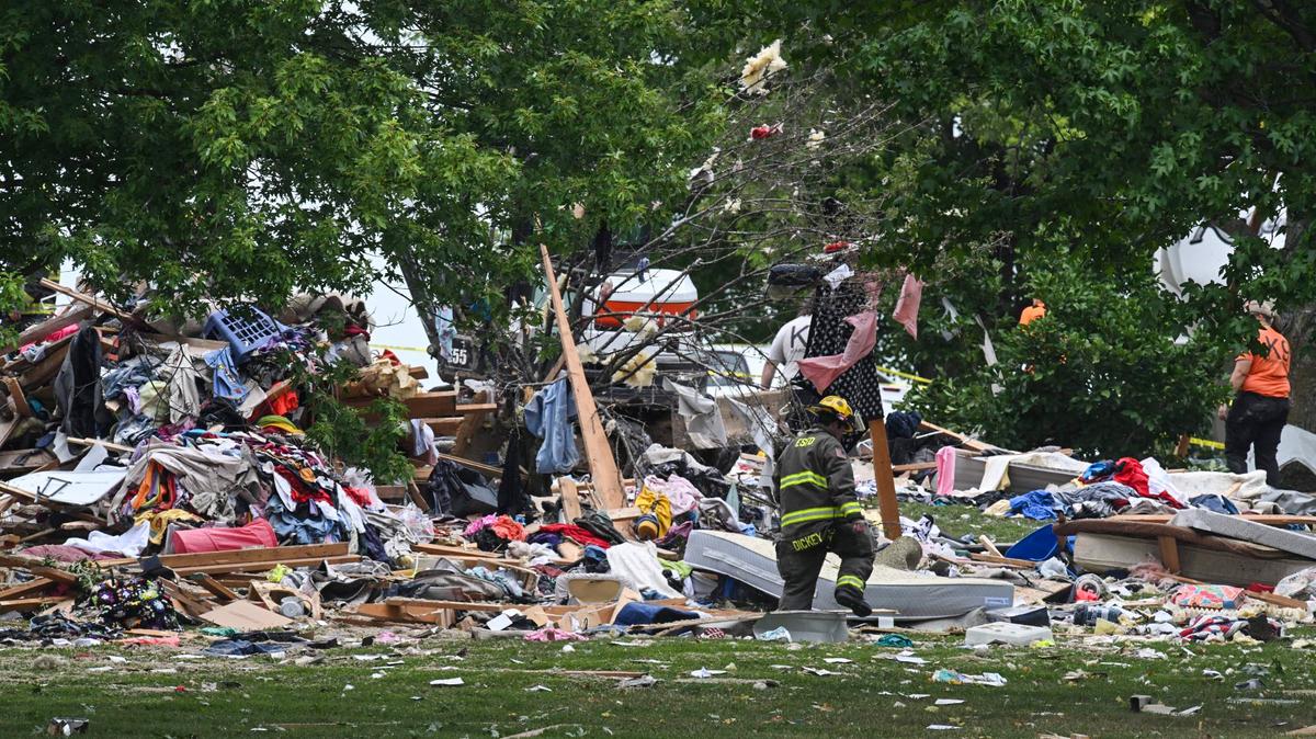 Investigators sift through debris from a home explosion happened in the early Friday near Excelsior Springs. The Clay County Sheriff’s Office said 70-year-old Oliver W. Campbell and 65-year-old Katherine A. Campbell were killed in the blast.