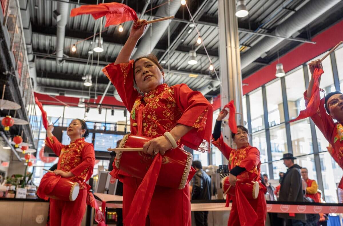 Performers dance during a Lunar New Year celebration at the Lenexa Public Market on Sunday, Feb. 22, 2026, in Lenexa.