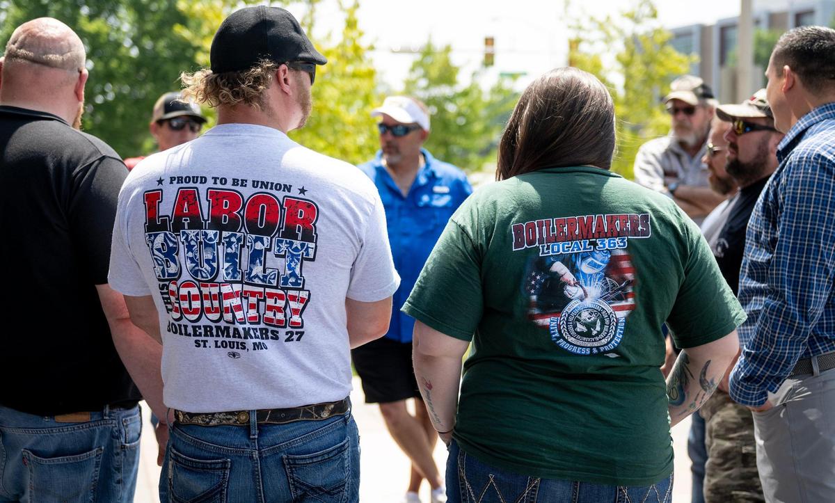 Members of the International Brotherhood of Boilermakers gathered outside the Robert J. Dole Federal Courthouse in Kansas City, Kansas, for an earlier hearing in the case.