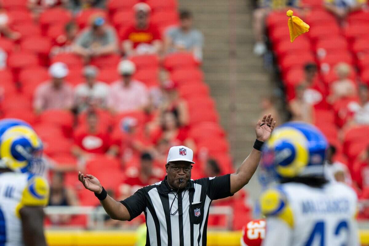 The referee throws a flag in the second half of the Chiefs preseason game against the Los Angeles Rams, on Saturday, August 15, 2026, at Arrowhead Stadium.