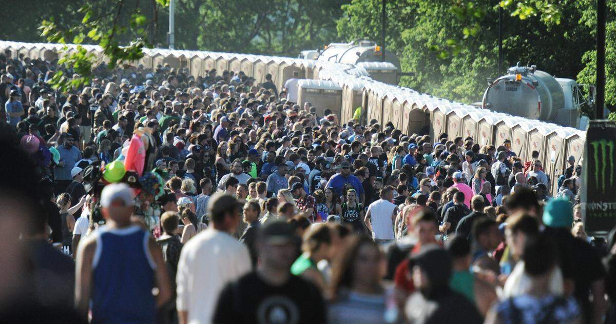Long lines surround numerous portable restrooms in 2016, during RockFest at Liberty Memorial in downtown Kansas City.