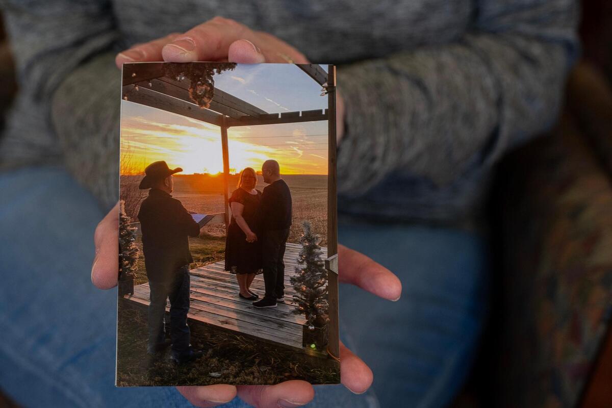 Kristy Tsen shows a photo of her December 2020 wedding. Kristy and Karl Tsen were married in front of small group of people at friend’s farm in the heart of the pandemic.