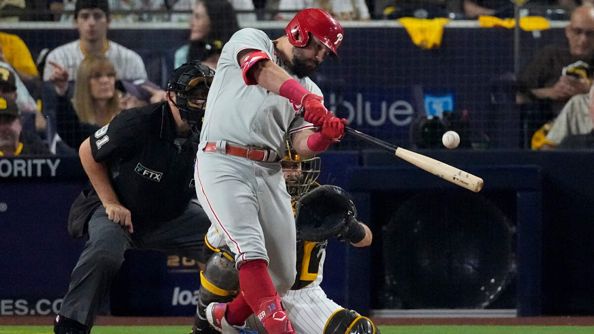 Philadelphia Phillies’ Kyle Schwarber hits a home run during the sixth inning in Game 1 of the baseball NL Championship Series between the San Diego Padres and the Philadelphia Phillies on Tuesday, Oct. 18, 2022, in San Diego. (AP Photo/Ashley Landis)