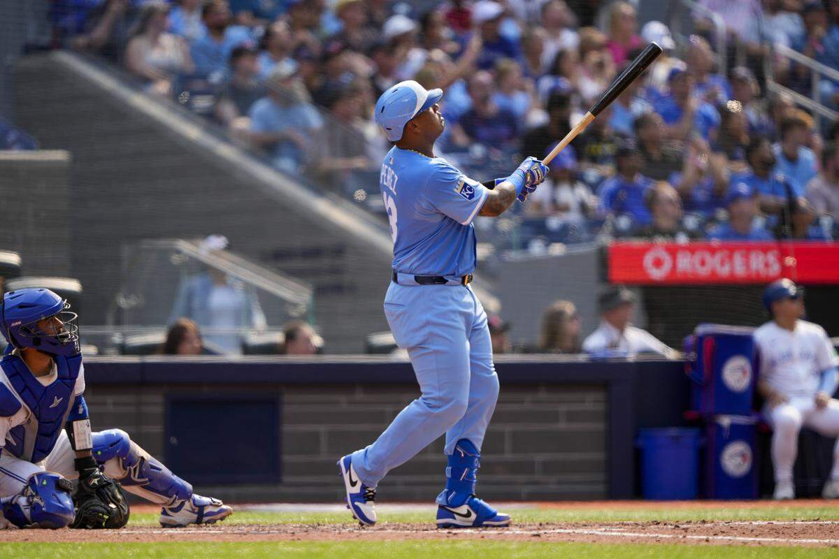 Kansas City Royals catcher Salvador Perez (13) hits a home run against the Toronto Blue Jays during the sixth inning at Rogers Centre on Aug. 2, 2025.
