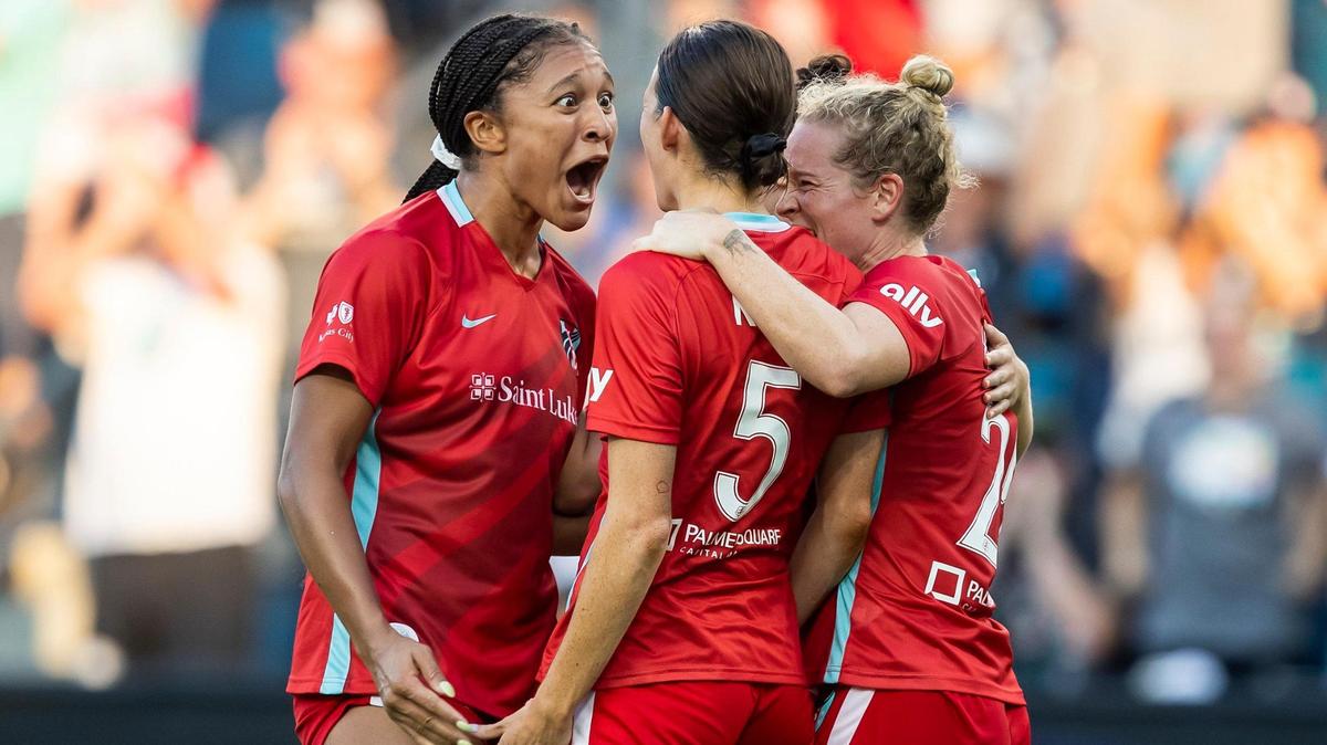KC Current Forward Elyse Bennett, left, celebrates with teammate Cece Kizer after scoring the tying goal against the Orlando Pride on Sunday at Children’s Mercy Park in Kansas City, Kansas.
