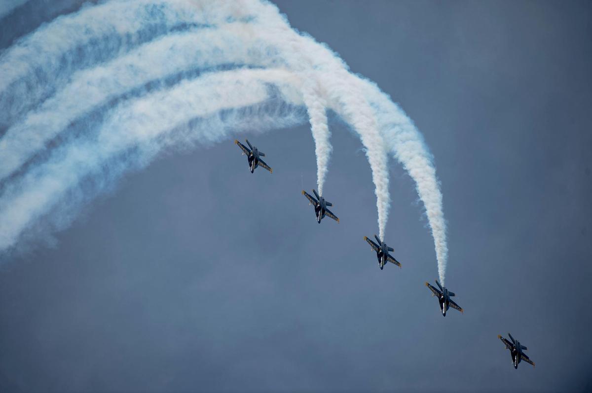 The U.S. Navy Blue Angels fly Thursday, July 1, 2021 at New Century AirCenter near Gardner, Kan. The Thunderbirds and Blue Angels arrived to fly in the KC Air Show this weekend.