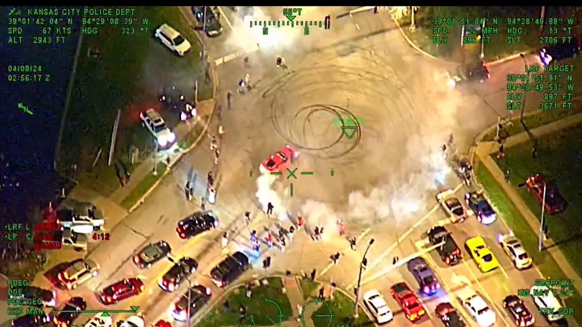 Helicopter surveillance footage from Kansas City police shows a car doing doughnuts in the intersection of Blue Ridge Boulevard and Sni-A-Bar Road. Illegal sideshows have been persisting in parts of Kansas City despite police and city efforts to deter them.