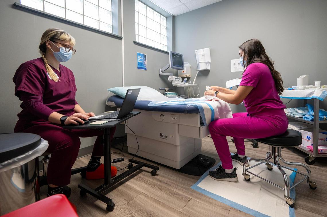 Clare, left, a registered nurse, and Selina Sandoval, Associate Medical Director, prepare to provide the first procedural abortion for a patient on Saturday, Feb. 15, 2025, at Planned Parenthood Great Plains in Kansas City. It was the first procedural abortion in Kansas City in about 15 years.