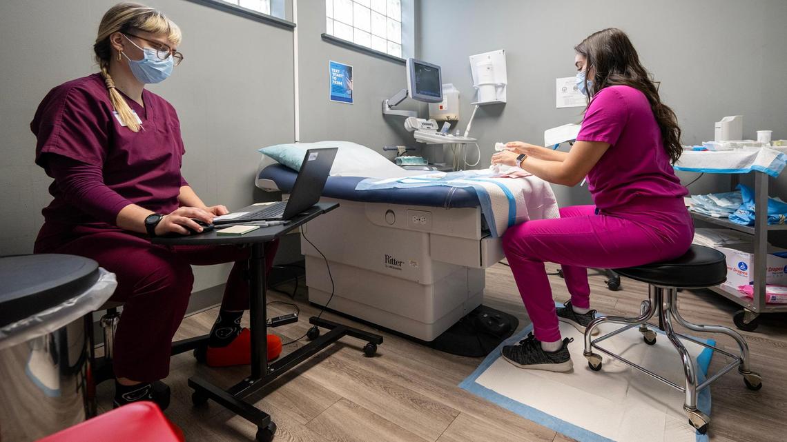 Clare, left, a registered nurse, and Selina Sandoval, Associate Medical Director, prepare to provide the first procedural abortion for a patient on Saturday, Feb. 15, 2025, at Planned Parenthood Great Plains in Kansas City. It was the first procedural abortion in Kansas City in about 15 years.