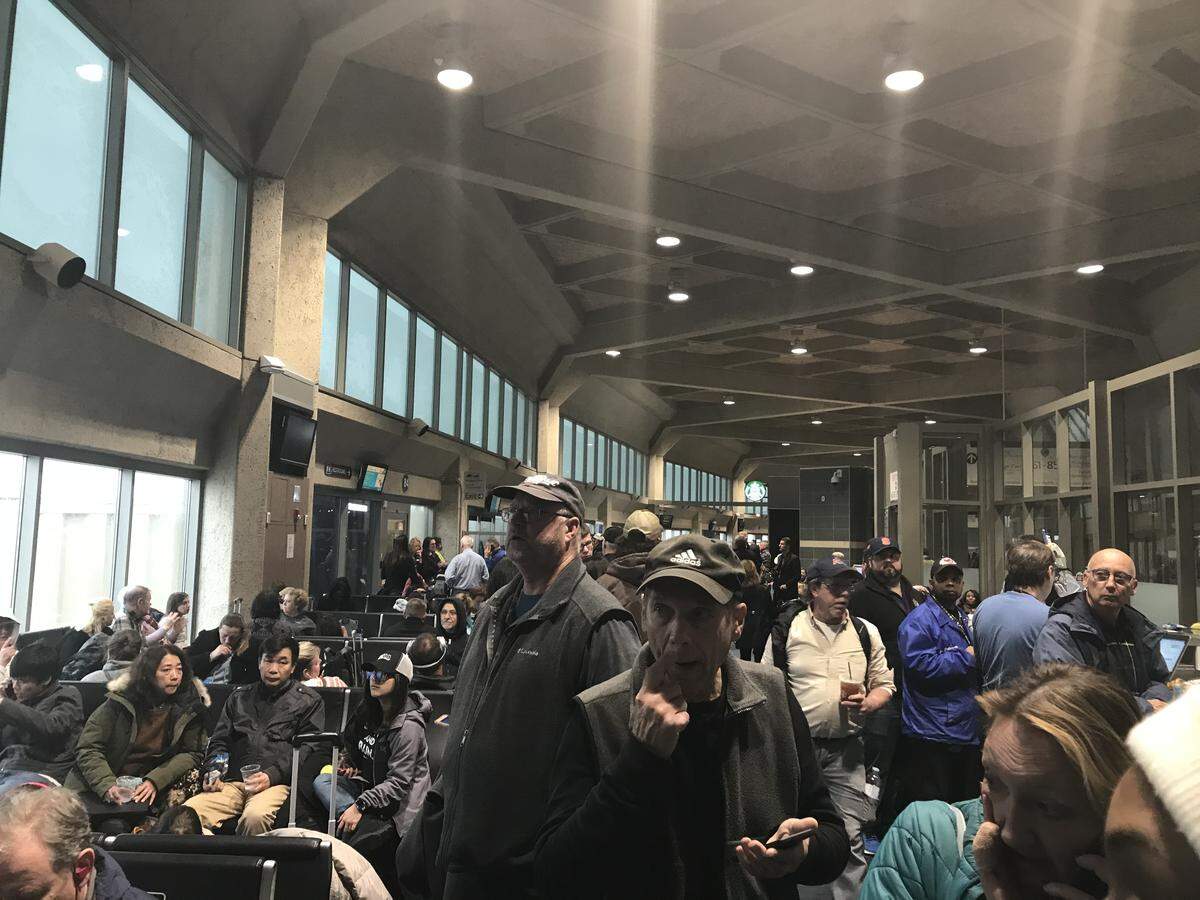 KCI was crowded with people waiting for the airport to reopen.