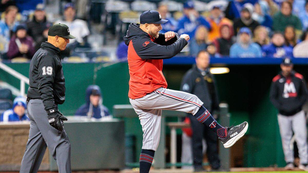 Minnesota Twins manager Rocco Baldelli kicks dirt on home plate after being ejected during the sixth inning against the Kansas City Royals at Kauffman Stadium.