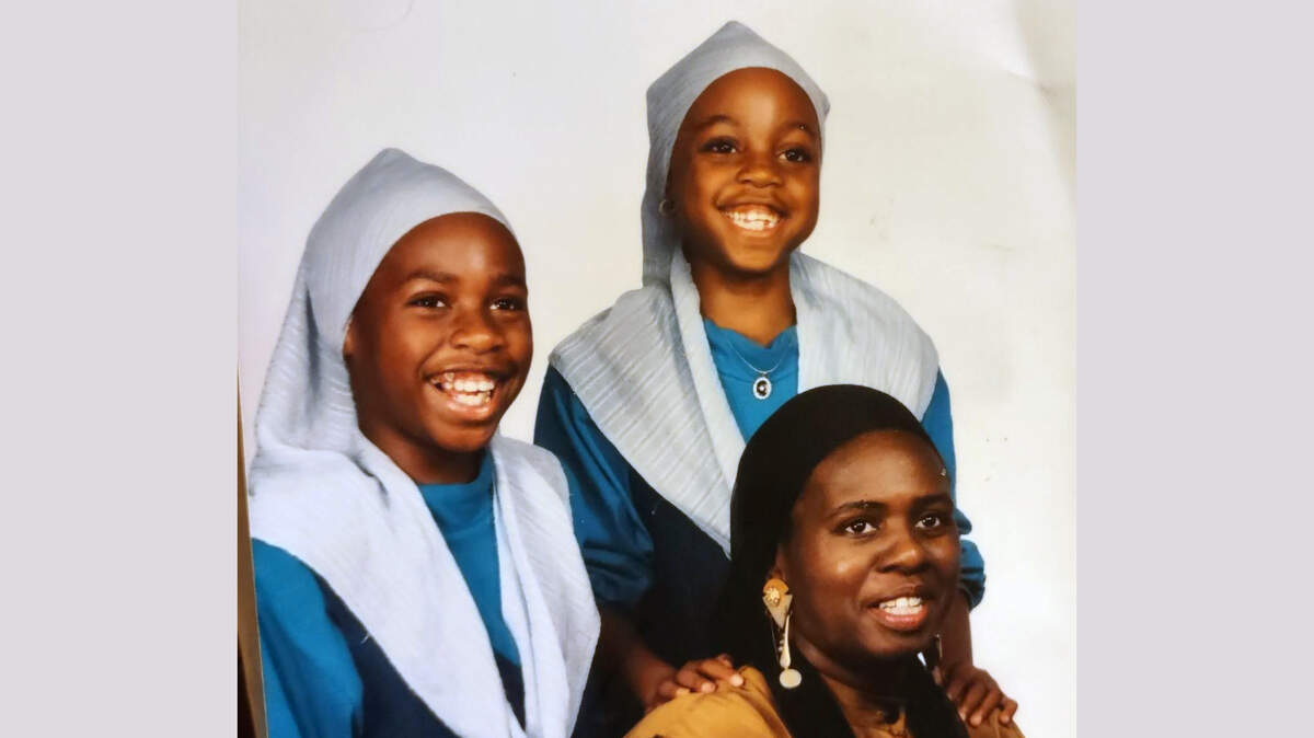 Sameemah Musawwir, bottom right, with her girls Quadriyyah Musawwir and Aisha Musawwir.