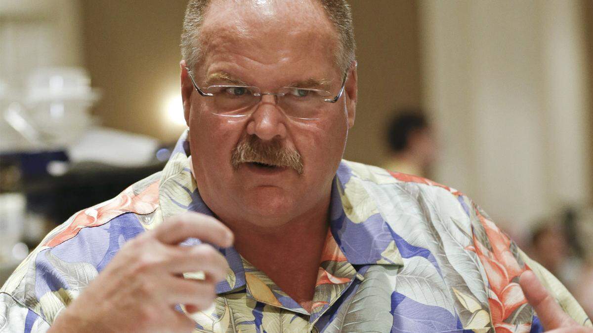 Andy Reid, head coach of the Kansas City Chiefs, talks with members of the media during an AFC head coaches breakfast at the NFL football annual meeting in Orlando, Fla., Tuesday, March 25, 2014. (AP Photo/John Raoux)