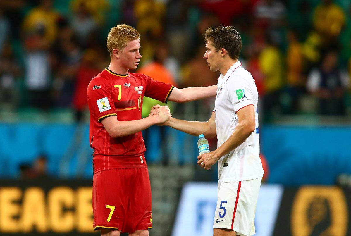 Belgium midfielder Kevin De Bruyne (7) greets United States defender Matt Besler (5) following the game in the round of sixteen match at the 2014 World Cup at Arena Fonte Nova in Brazil on July 1, 2014.