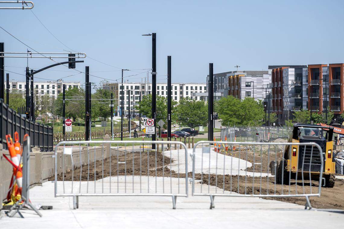 Barricades block the Grand Boulevard Pedestrian/Bike Bridge along Berkley Parkway on Monday, April 20, 2026, in Kansas City.