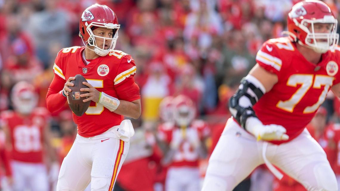 Kansas City Chiefs quarterback Patrick Mahomes (15) looks for an open receiver during an NFL football game against the Denver Broncos at GEHA Field at Arrowhead Stadium on Sunday, Jan. 1, 2023, in Kansas City.