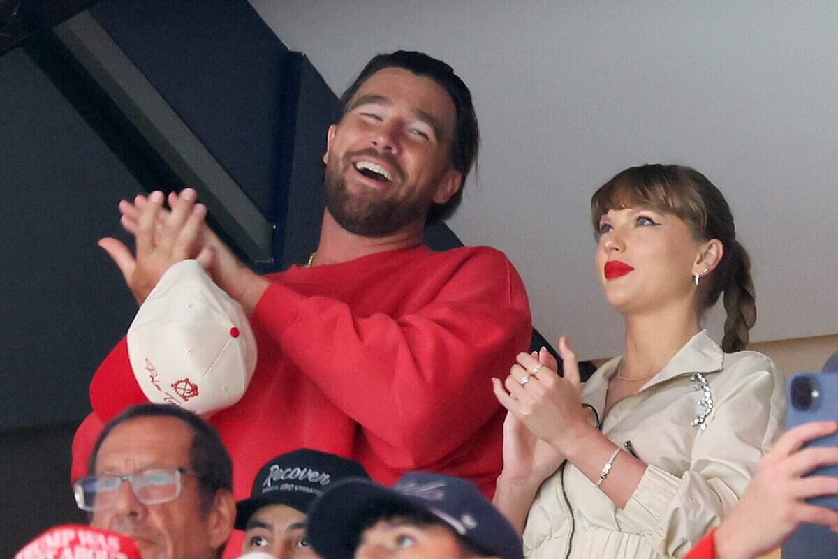 Travis Kelce, left, and Taylor Swift react as the Edmonton Oilers and the Florida Panthers play during the first period in Game 4 of the 2025 Stanley Cup Final at Amerant Bank Arena on June 12, 2025, in Sunrise, Florida. (Bruce Bennett/Getty Images/TNS)