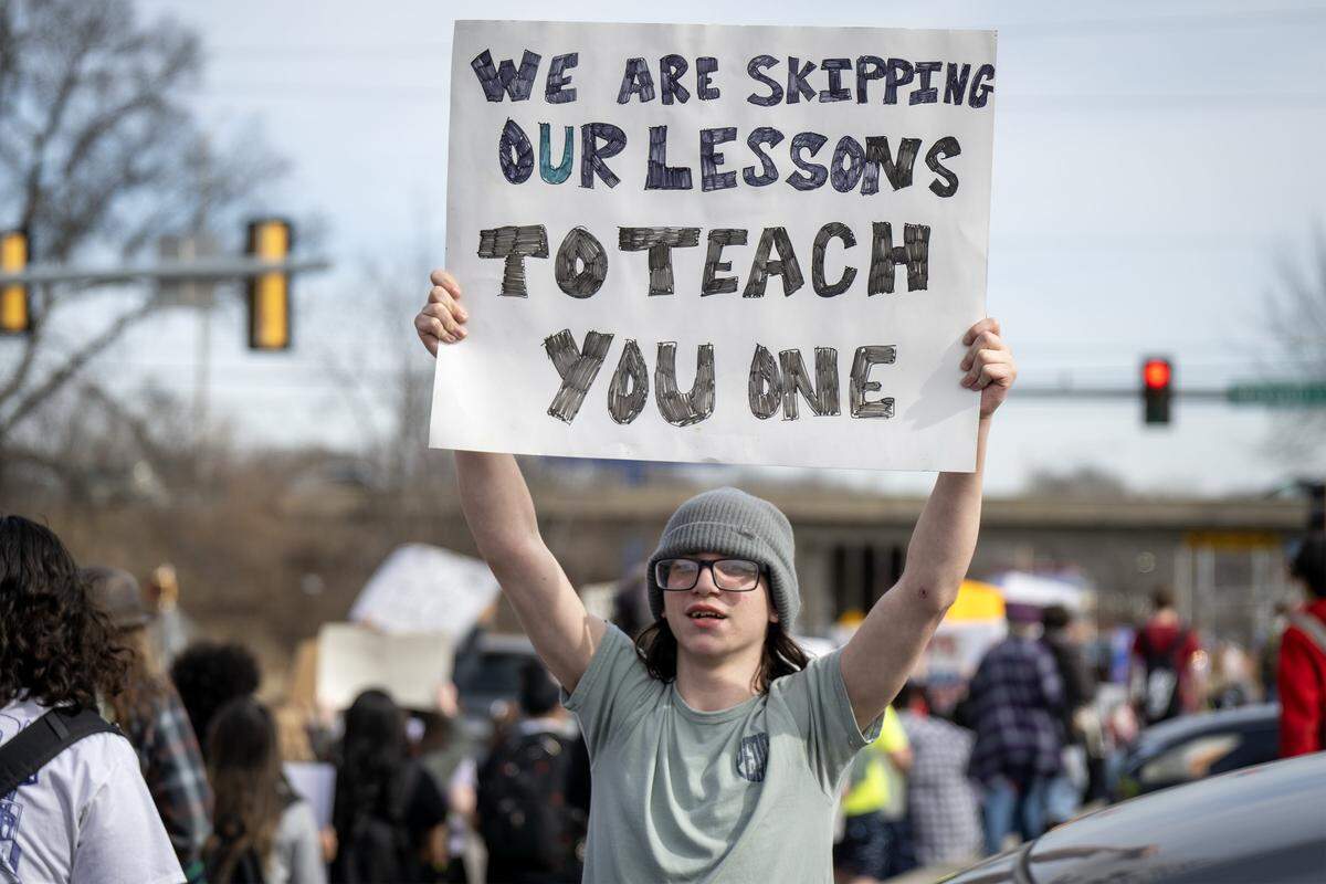 Shawnee Mission North High School students marched in protest of ICE and the Trump administration on Wednesday, February 11, 2026, in Overland Park.