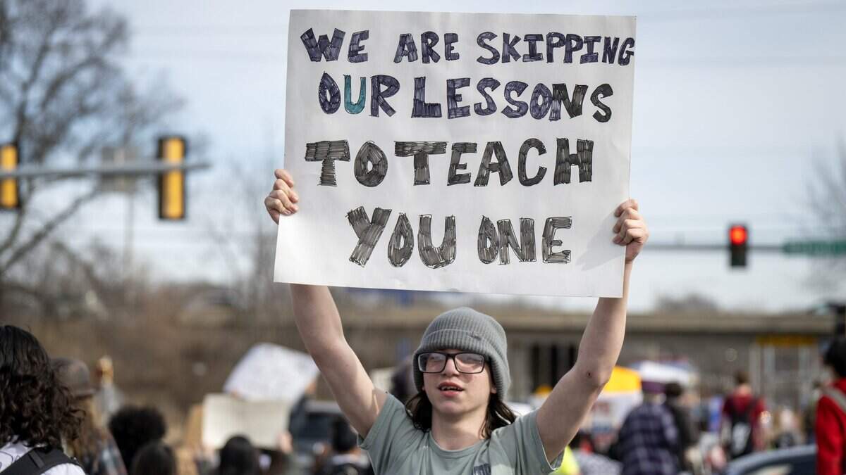 Shawnee Mission North High School students marched in protest of ICE and the Trump administration on Wednesday, February 11, 2026, in Overland Park.