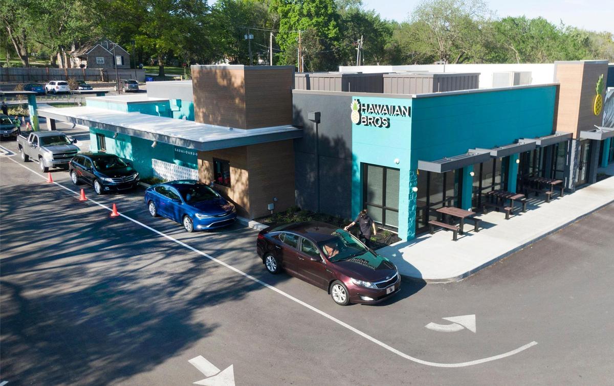 Cars line the drive-thru at Hawaiian Bros Island Grill, which recently opened another location in Shawnee. The fast-casual restaurant serves plate meals similar to those found in Hawaii. The restaurant tries to get cars through the drive through in about 90 seconds.