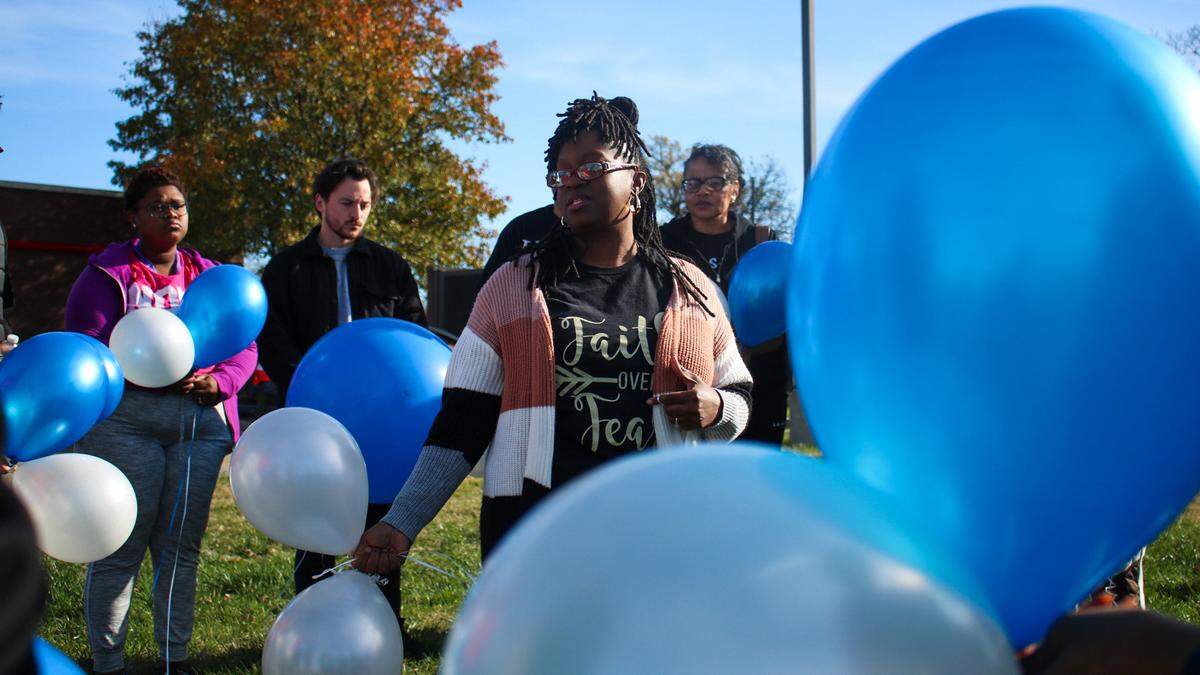 LaTasha Crawford speaks at a balloon release for her brother Kenneth R. Williams Jr. Nov. 23, 2024. Crawford is asking for police to release the surveillance video from when he was shot and killed by a Raytown police officer on Nov. 9.