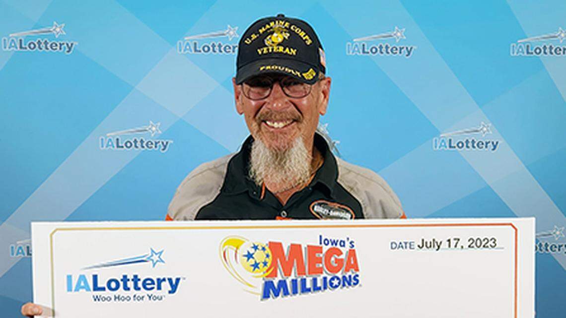 Michael “Hoogie” Hoogerwerf with his oversized check.