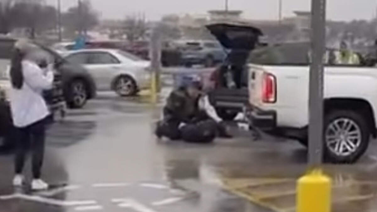 A screenshot of a video on social media shows ICE agents arresting a man at an Olathe Walmart on Feb. 14, 2026.
