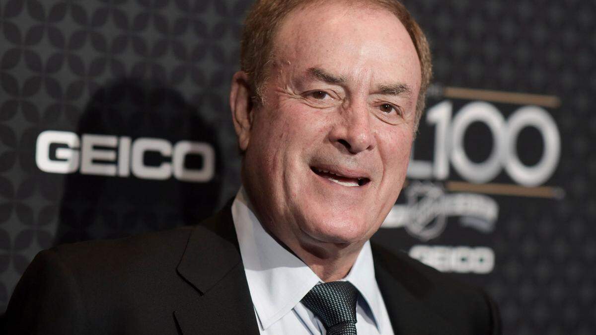 FILE- In this Jan. 27, 2017, file photo, NBC “Sunday Night Football” announcer Al Michaels arrives at the The NHL100 Gala held at the Microsoft Theater in Los Angeles. Michaels said a huge reason for the league’s popularity on television is because it is best suited sport for it. “You have this burst of action and then there is inaction that can be covered by analyzing the play and covering it on replay,” he said. (Photo by Richard Shotwell/Invision/AP, File)