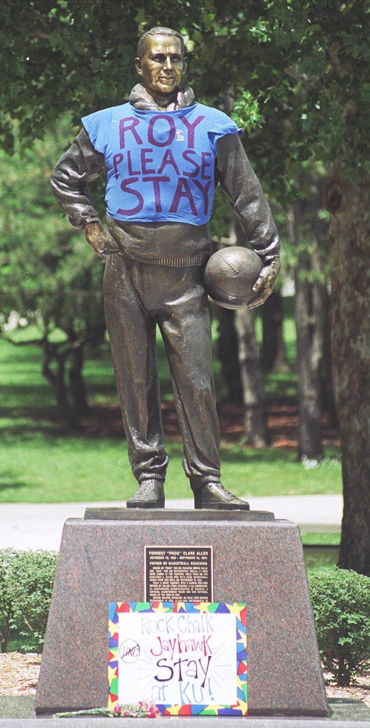 [KANSAS WILLIAMS 9 ]The statue of legendary Kansas basketball coach Forest ‘Phog’ Allen is adorned with a T-shirt that expresses Kansas University basketball fans’ hopes that coach Roy Williams will choose to stay in Lawrence rather than move to North Carolina in 2000 where he was considered a leading contender for the job being vacated by Bill Gutheridge.
