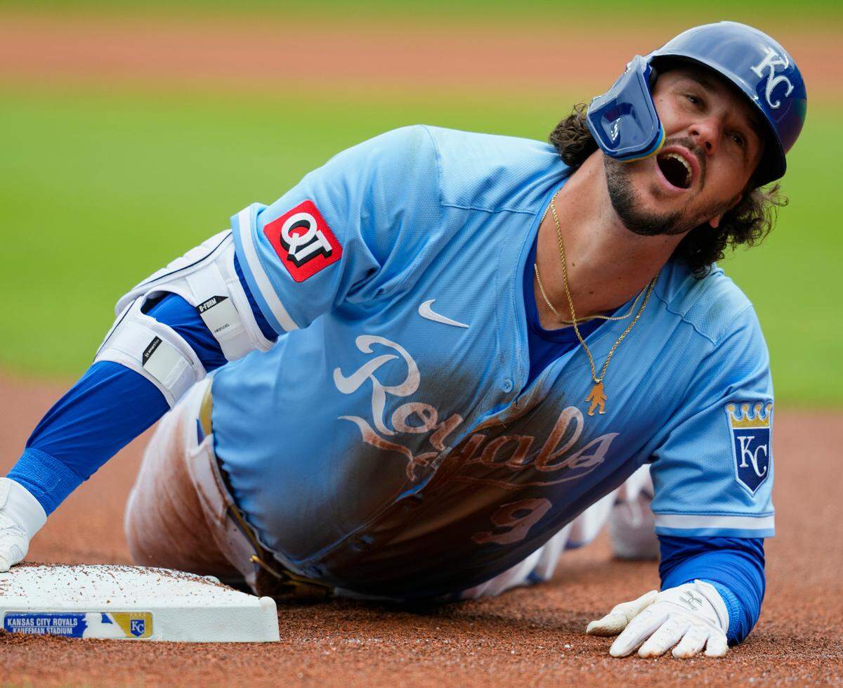 Kansas City Royals designated hitter Vinnie Pasquantino belted a triple during a game against the Cleveland Guardians at Kauffman Stadium on Sunday, March 30, 2025.