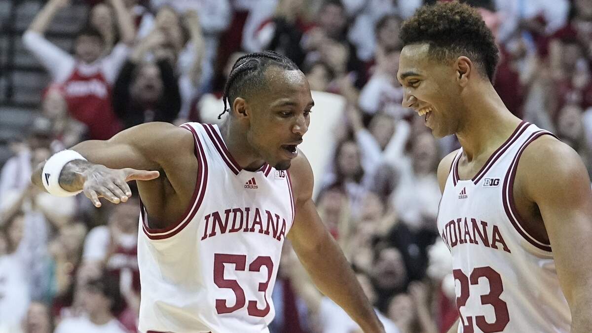 Indiana’s Tamar Bates, left, celebrates a shot with teammate Trayce Jackson-Davis during the Hoosiers’ recent game against Nebraska.