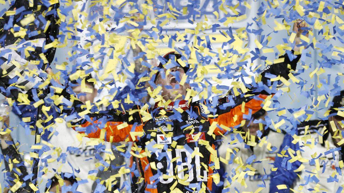Christian Eckes is covered with confetti as he celebrates winning the ARCA auto racing season championship at Kansas Speedway in Kansas City, Kan., Friday, Oct. 18, 2019. (AP Photo/Colin E. Braley)