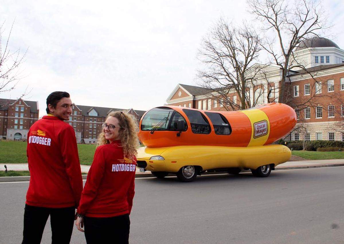 Nick "Cheesy Nicks" Koors and Rosie "Rose Beef" Hutchison are driving across the country in an Oscar Mayer Wienermobile named "Big Bun." Hutchison, a KC native and Mizzou grad, says she loves seeing people react to the giant hot dog on wheels.