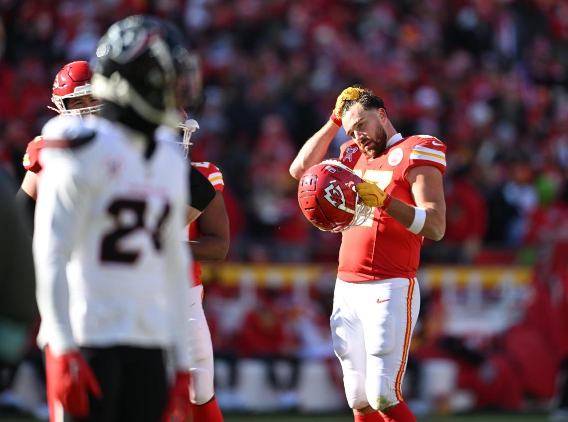 Kansas City Chiefs tight end Travis Kelce (87) takes off his helmet during a break in the action while the Chiefs took on the Houston Texans on Saturday, Dec. 21, 2024, at GEHA Field at Arrowhead Stadium.