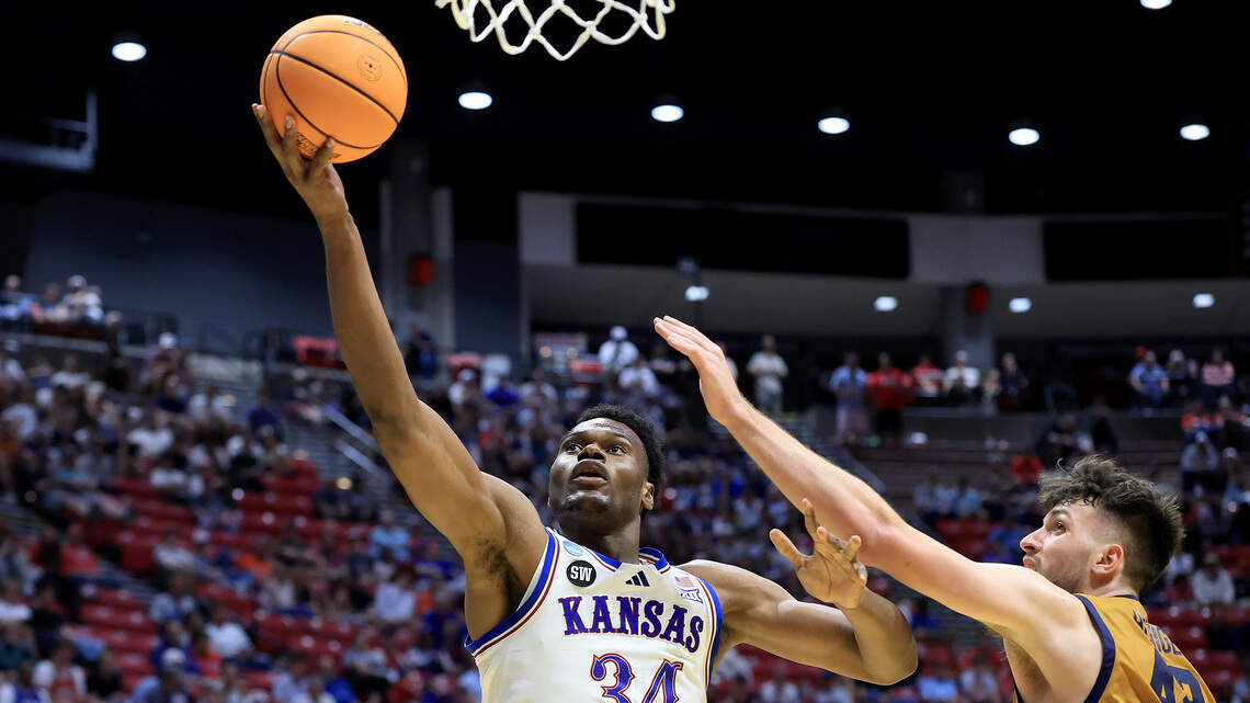 Kansas Jayhawks hoops team’s 7-foot sophomore due back from overseas trip Monday