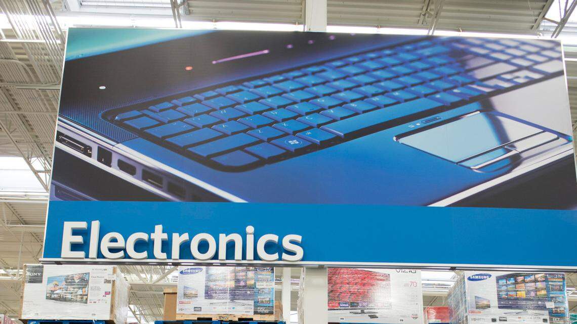 File photo of the electronics department at a Sam’s Club. Police in Ohio say a man shot and killed a Walmart shopper after trying to steal from the store’s electronics section.