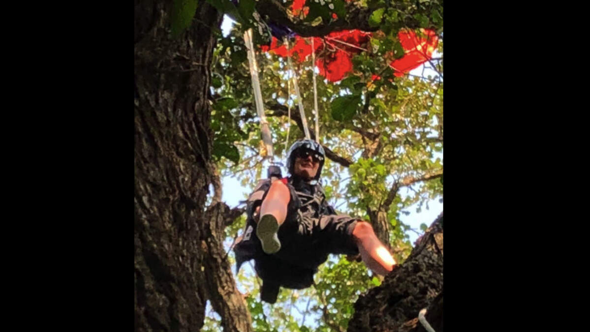 Abbey Lacy of Omaha, Nebraska, landed 70 feet up in a tree on her first solo skydiving jump. She danged for more than three hours until the fire department rescued her with an aerial ladder.
