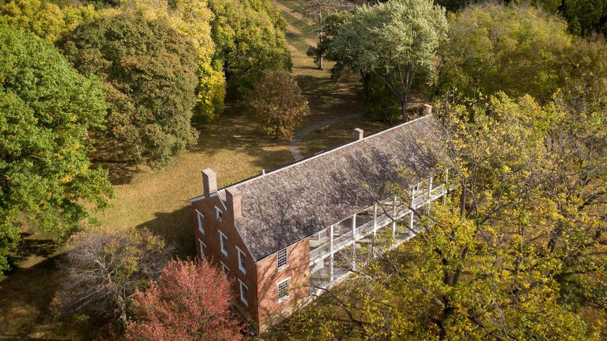 The Kansas Historical Society plans to use ground-penetrating radar to search the 12 acres of the Shawnee Indian Mission in Fairway for children who might be buried there. This view shows the north building, looking north toward Bishop Miege High School.