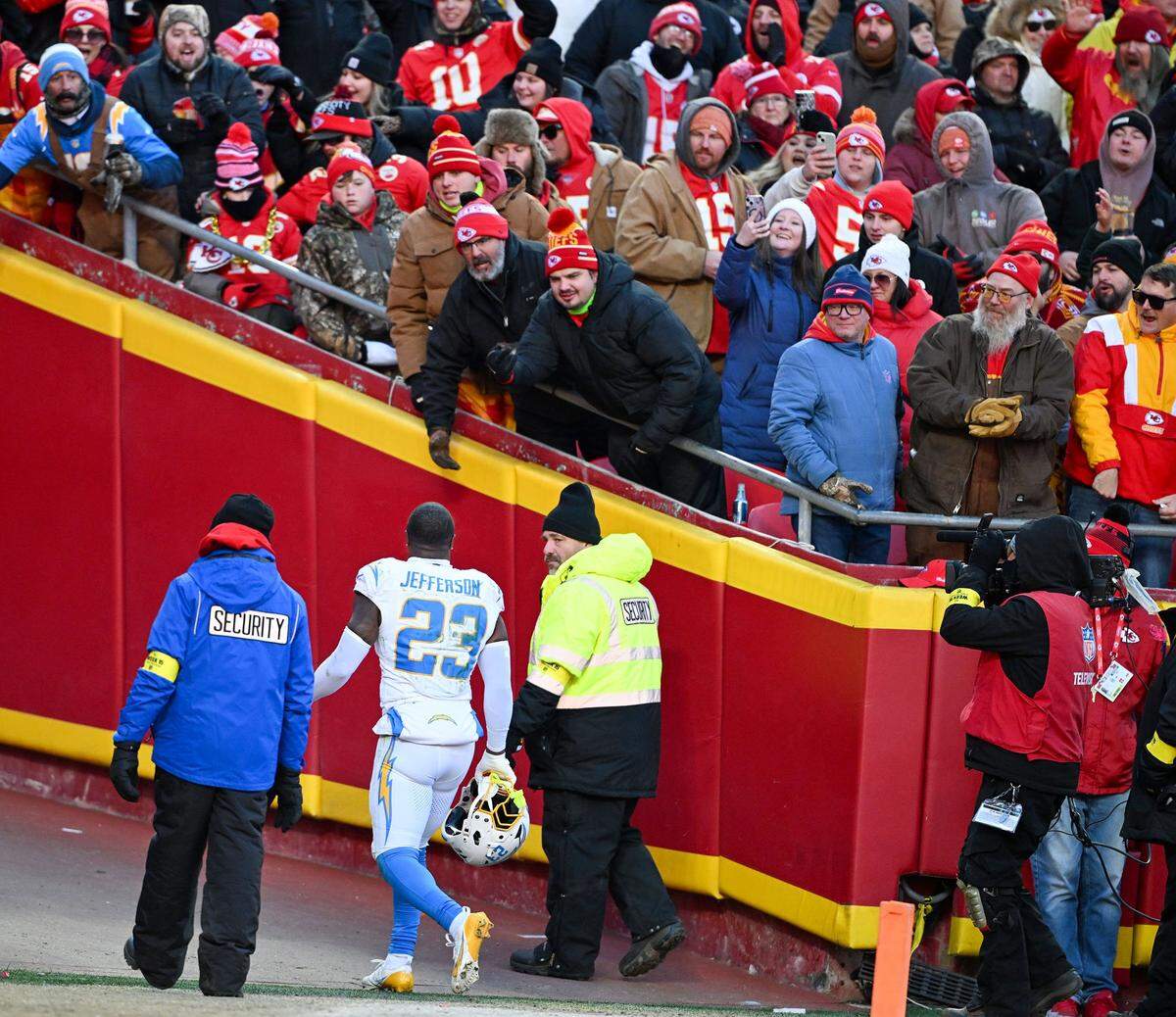 Los Angeles Chargers safety Tony Jefferson (23) walks off the field after being ejected for a helmet-to-helmet hit against the Kansas City Chiefs at GEHA Field at Arrowhead Stadium on Sunday, Dec. 14, 2025.