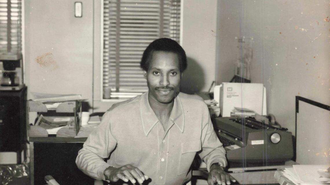 Larry Jackson Jr. sits at the desk of one of his many offices over the years. In the 1990s, he started an advertising firm in the Lincoln Building that produced a Black Visitor’s Guide to Kansas City.