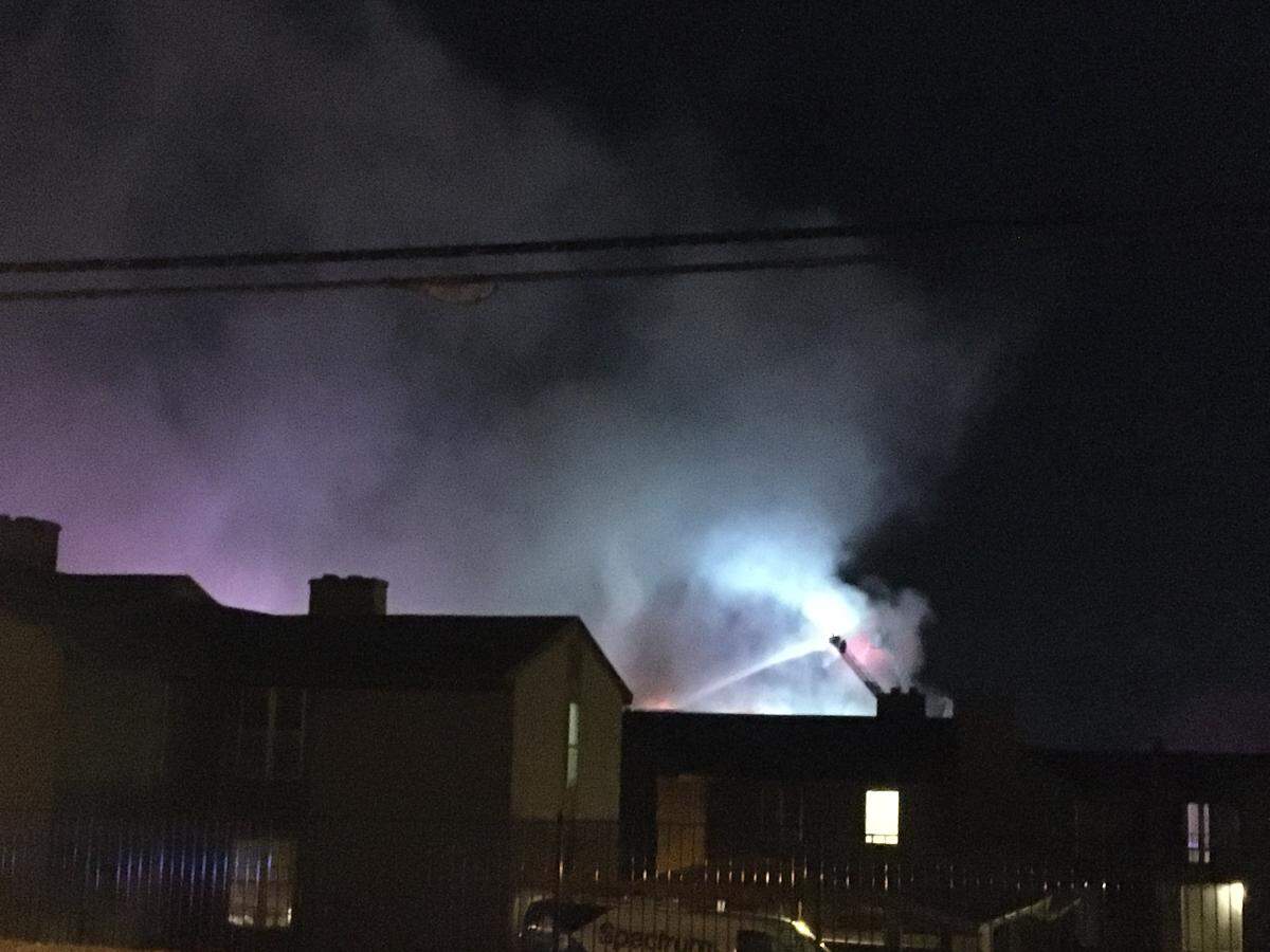Kansas City firefighters work to contain a fire at Willow Creek Apartments Wednesday, March 4, 2020.