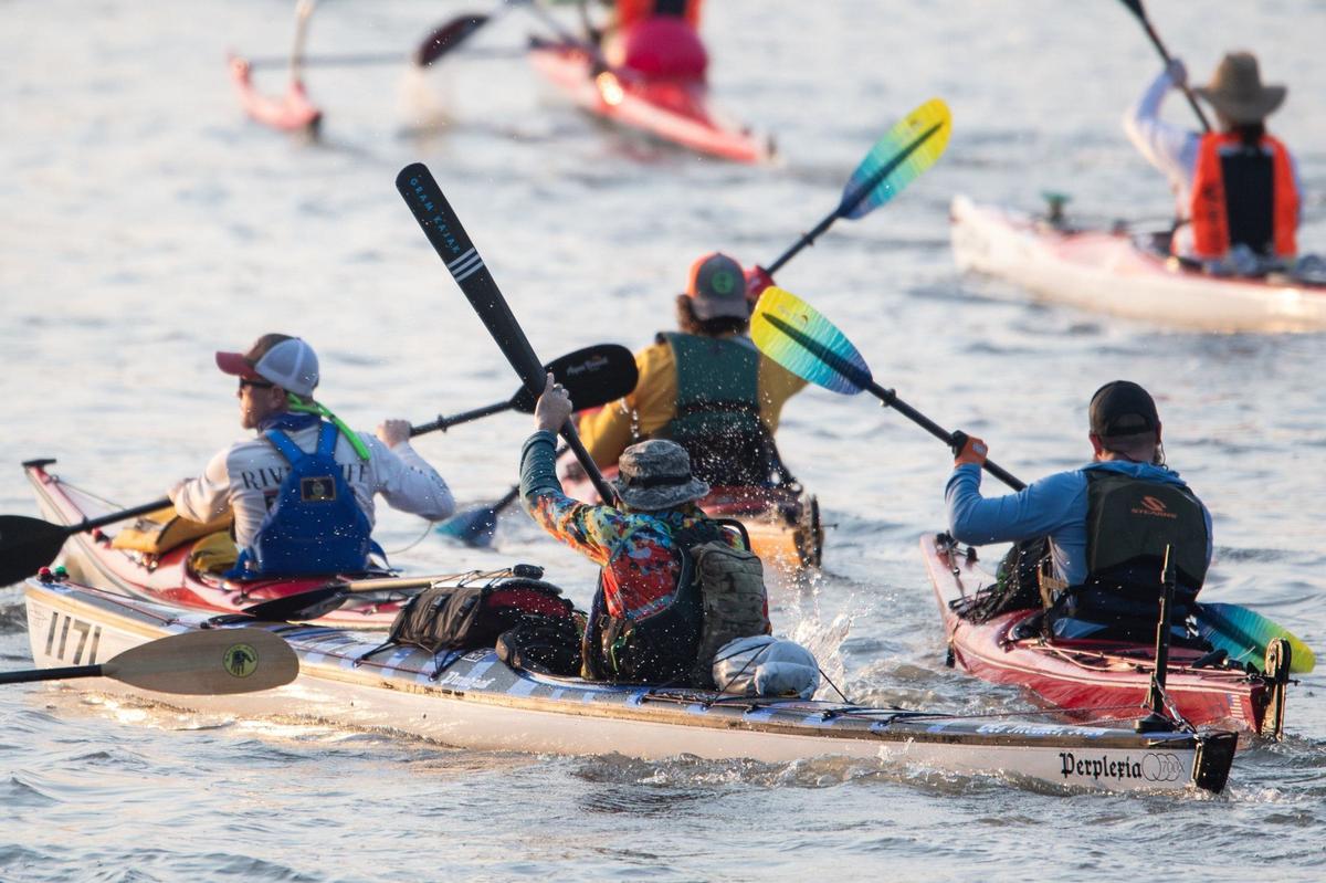 Individual racers in the MR340 river race take off down the Missouri River starting near Kaw Point on Tuesday, July 23, 2024, in Kansas City, Kansas.