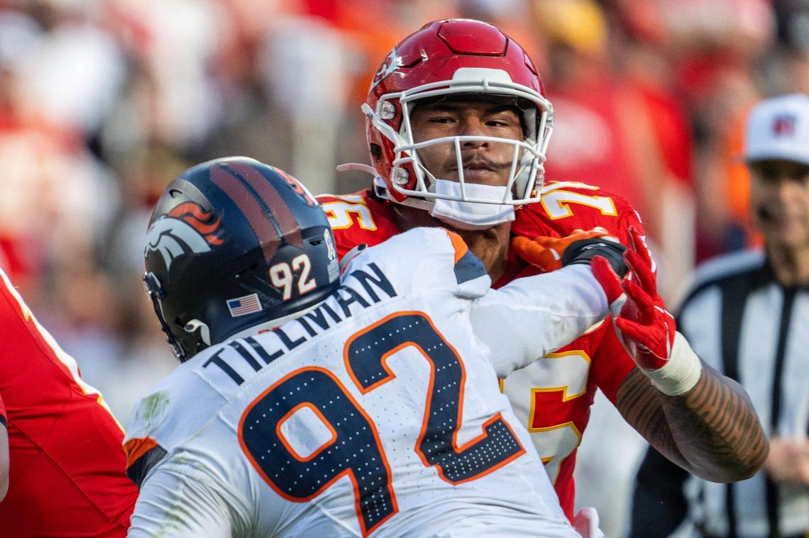 Kansas City Chiefs offensive tackle Kingsley Suamataia (76) tackles Denver Broncos linebacker Dondrea Tillman (92) in the third quarter during an NFL game on Sunday, Nov. 10, 2024, at GEHA Field at Arrowhead Stadium.